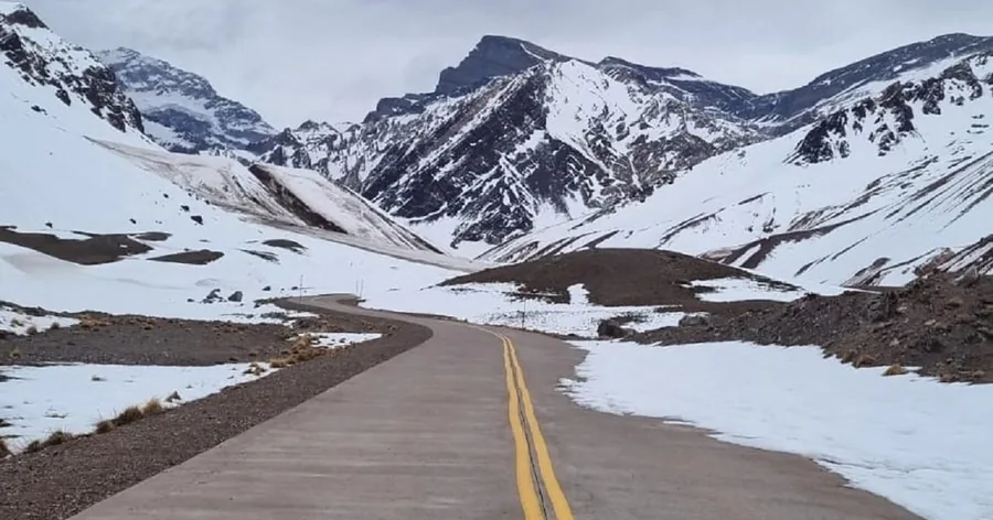 Route 7 climbing through a snowy valley towards the Chilean border in winter